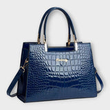 Cécile. - Sjajna torbica s uzorkom krokodila